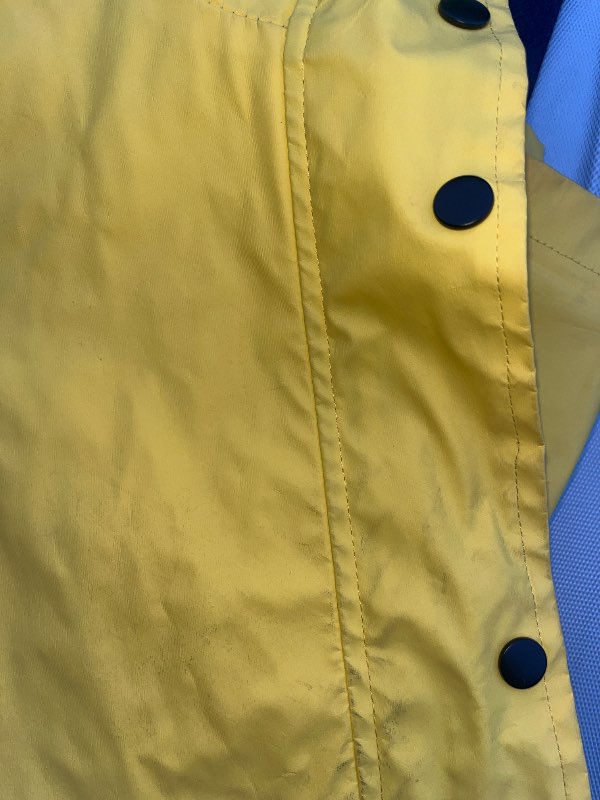 Haily's yellow waterproof jacket