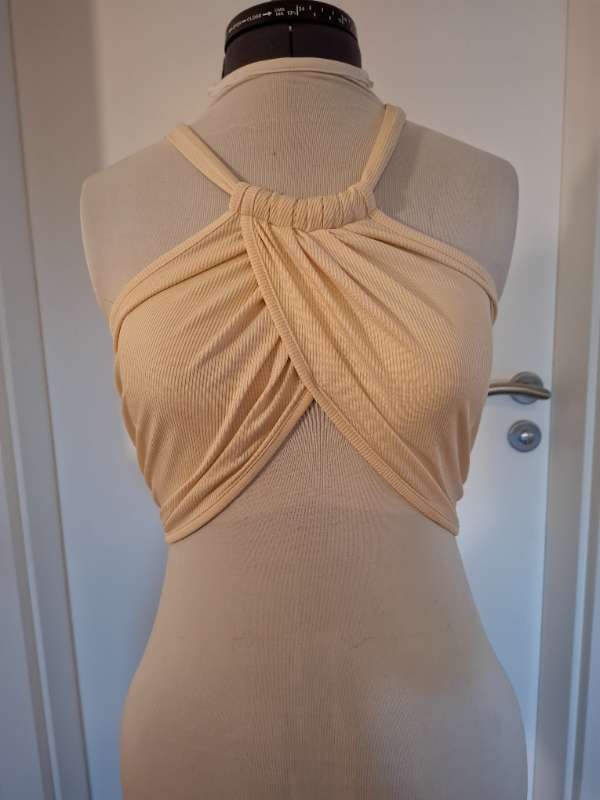 Beige toppur
