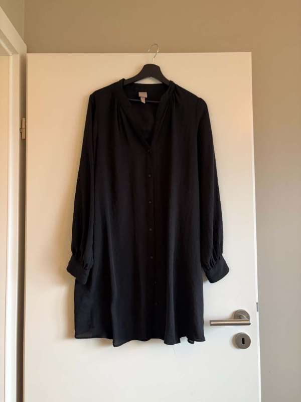 Svört og síð blússa - H&M