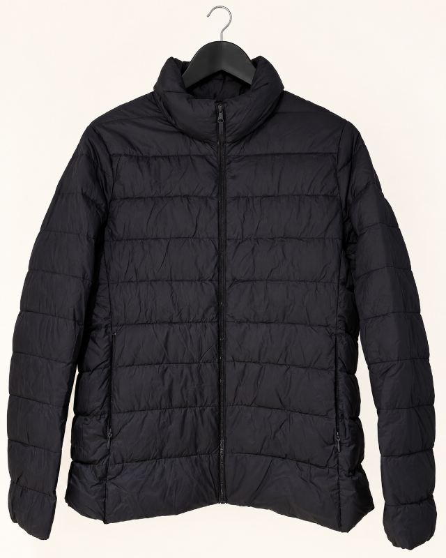 Uniqlo dökkblá primaloft úlpu