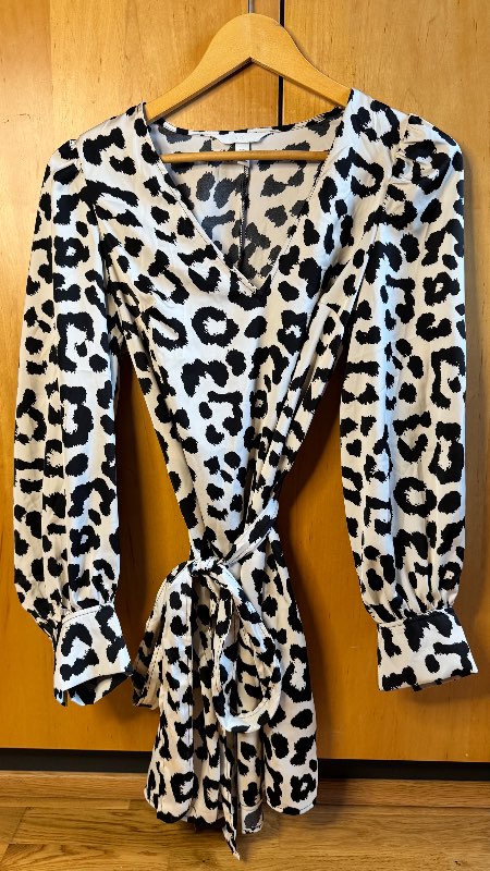 Black & white wrap-style mini dress