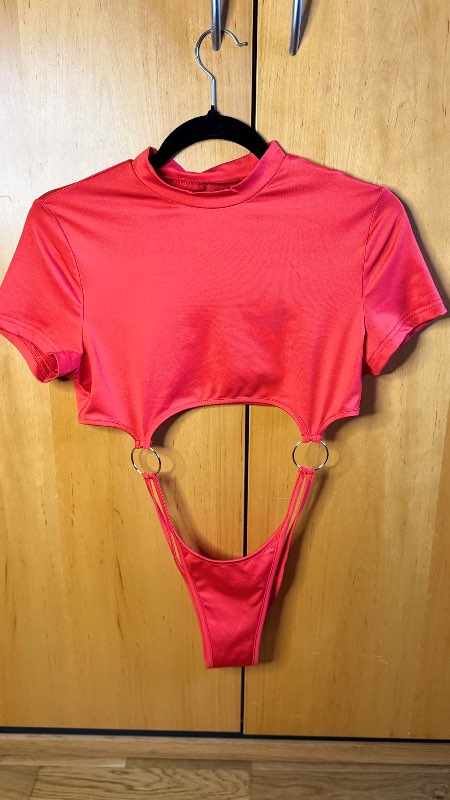 Red cut-out bodysuit with ring details