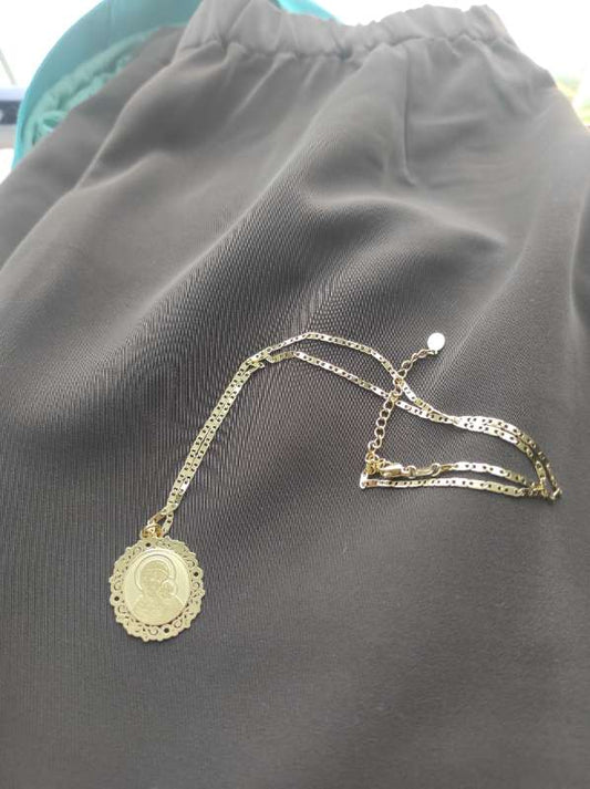 Hálsmenog Medal Eins og gull.Það verður ekki svart