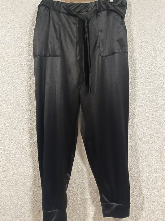 Glansandi buxur plus size