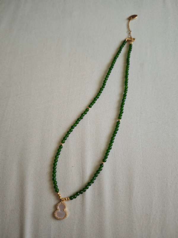 48  green jade necklace