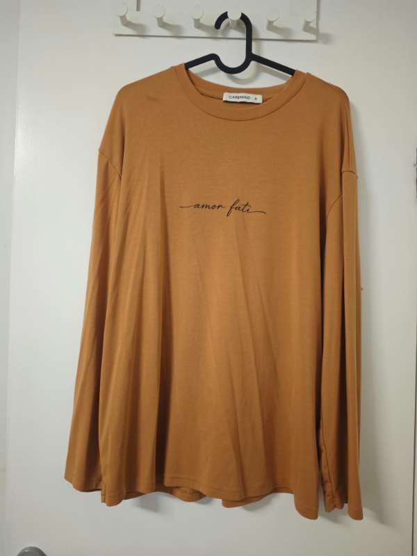 14 Orange shirt
