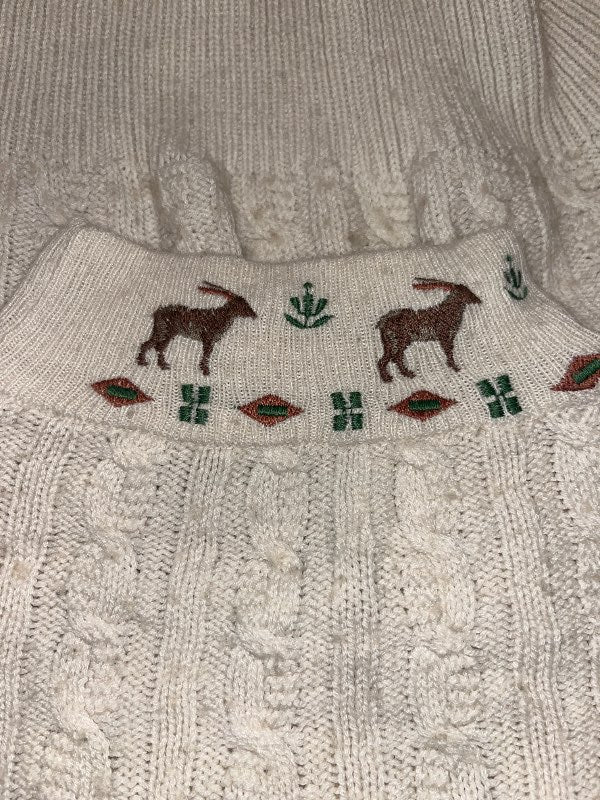 a sweater with reindeer