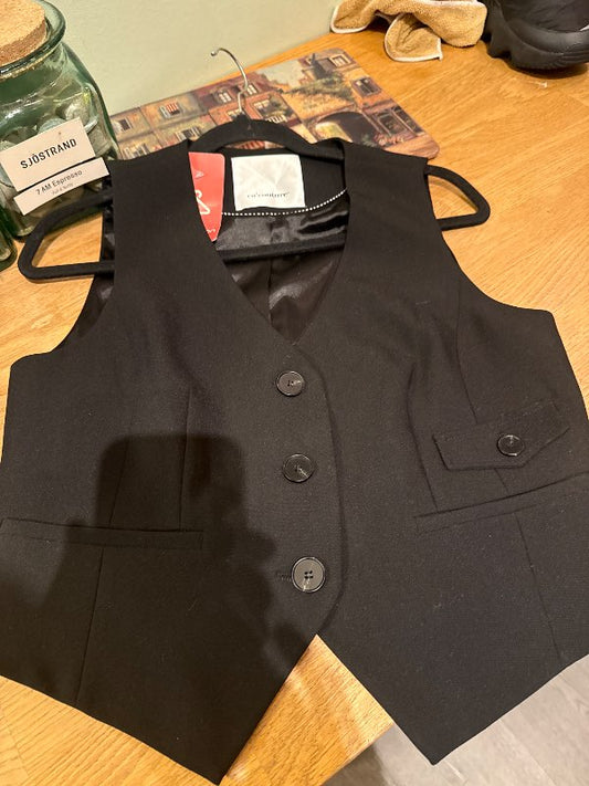 Svart vesti Co’couture