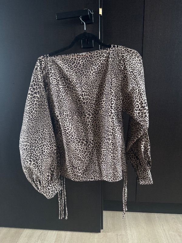 Ghospell leopard toppur