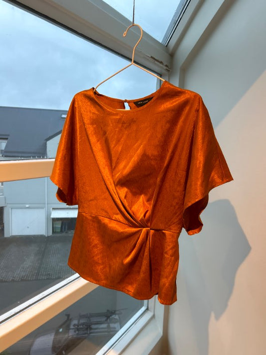 Orange silk shirt