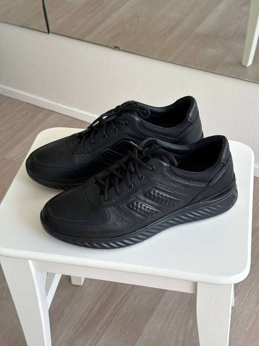Black skin sneakers